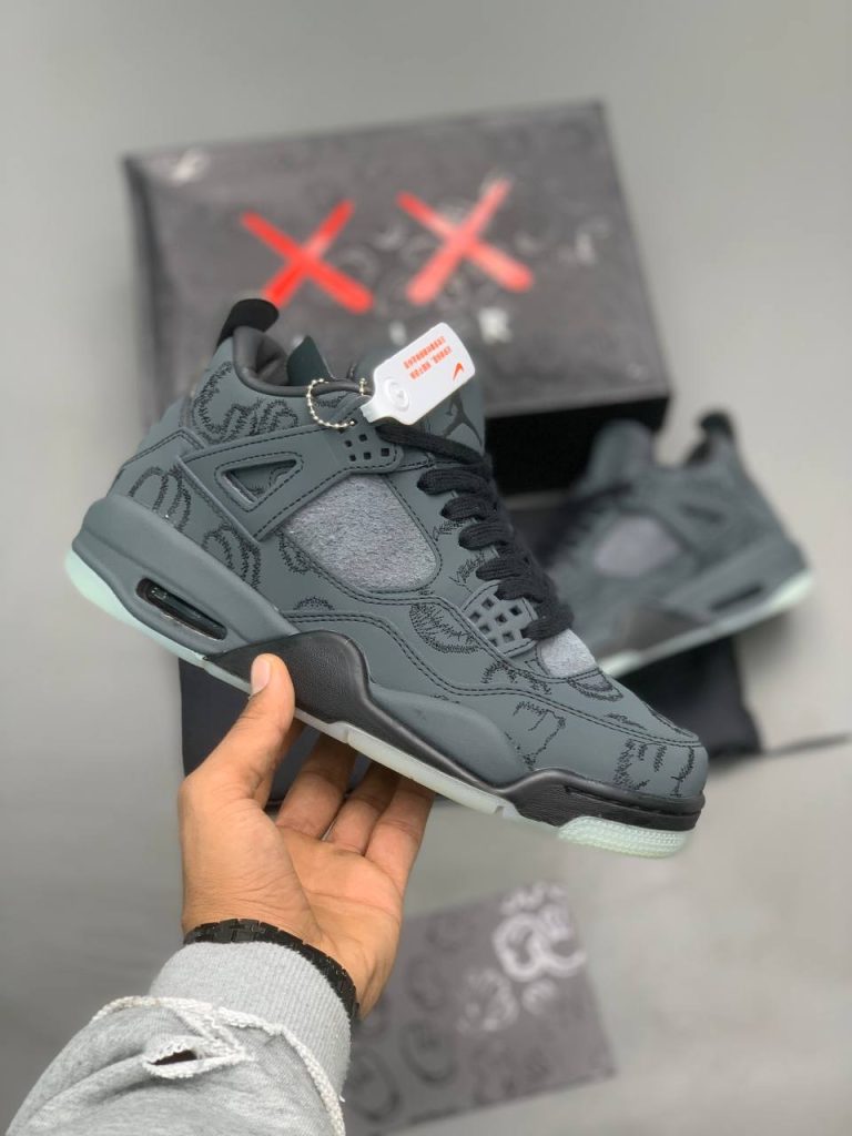 Air Jordan 4 Retro x Kaws black suede luminous